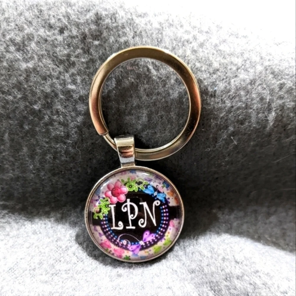 LPN keychain silver round flowers butterfly Nurse‎
